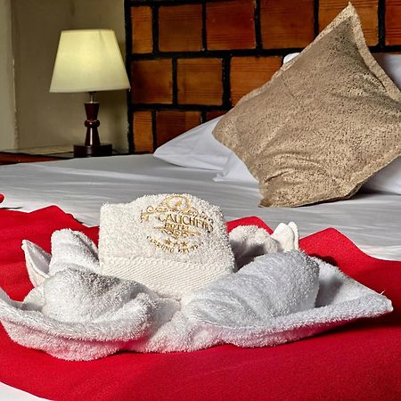 El Cauchero Hotel อีกีโตส ภายนอก รูปภาพ