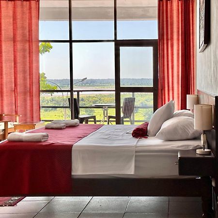 El Cauchero Hotel อีกีโตส ภายนอก รูปภาพ