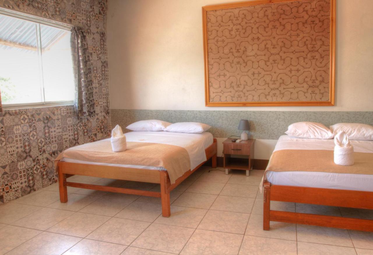 El Cauchero Hotel อีกีโตส ภายนอก รูปภาพ