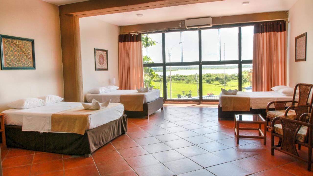 El Cauchero Hotel อีกีโตส ภายนอก รูปภาพ