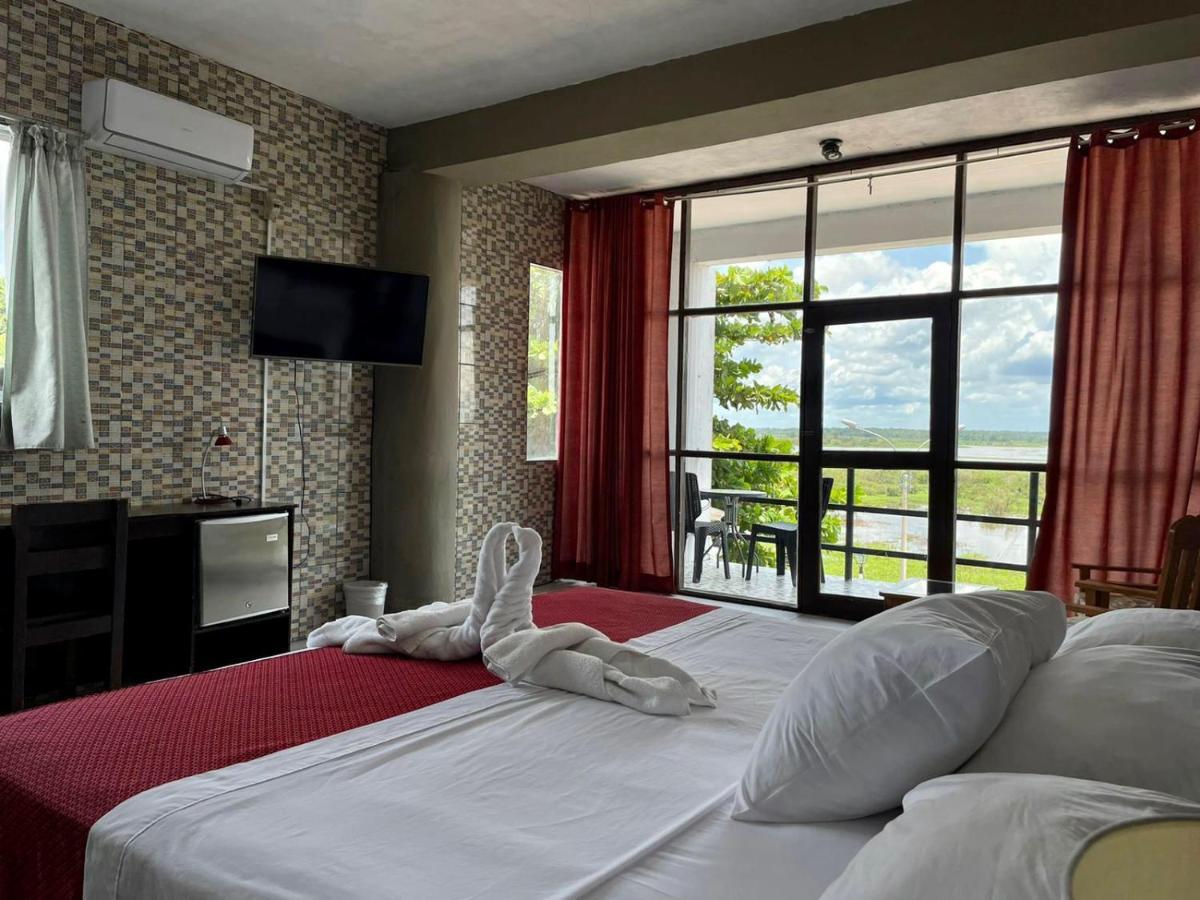 El Cauchero Hotel อีกีโตส ภายนอก รูปภาพ