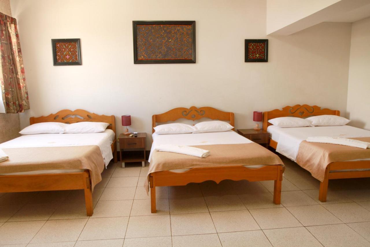 El Cauchero Hotel อีกีโตส ภายนอก รูปภาพ