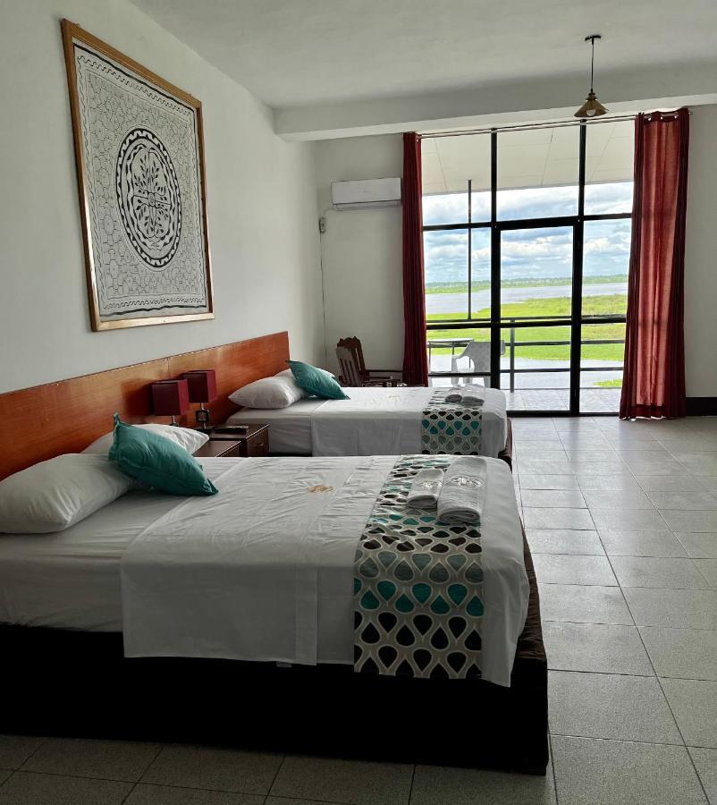 El Cauchero Hotel อีกีโตส ภายนอก รูปภาพ