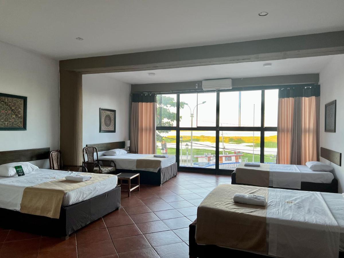 El Cauchero Hotel อีกีโตส ภายนอก รูปภาพ