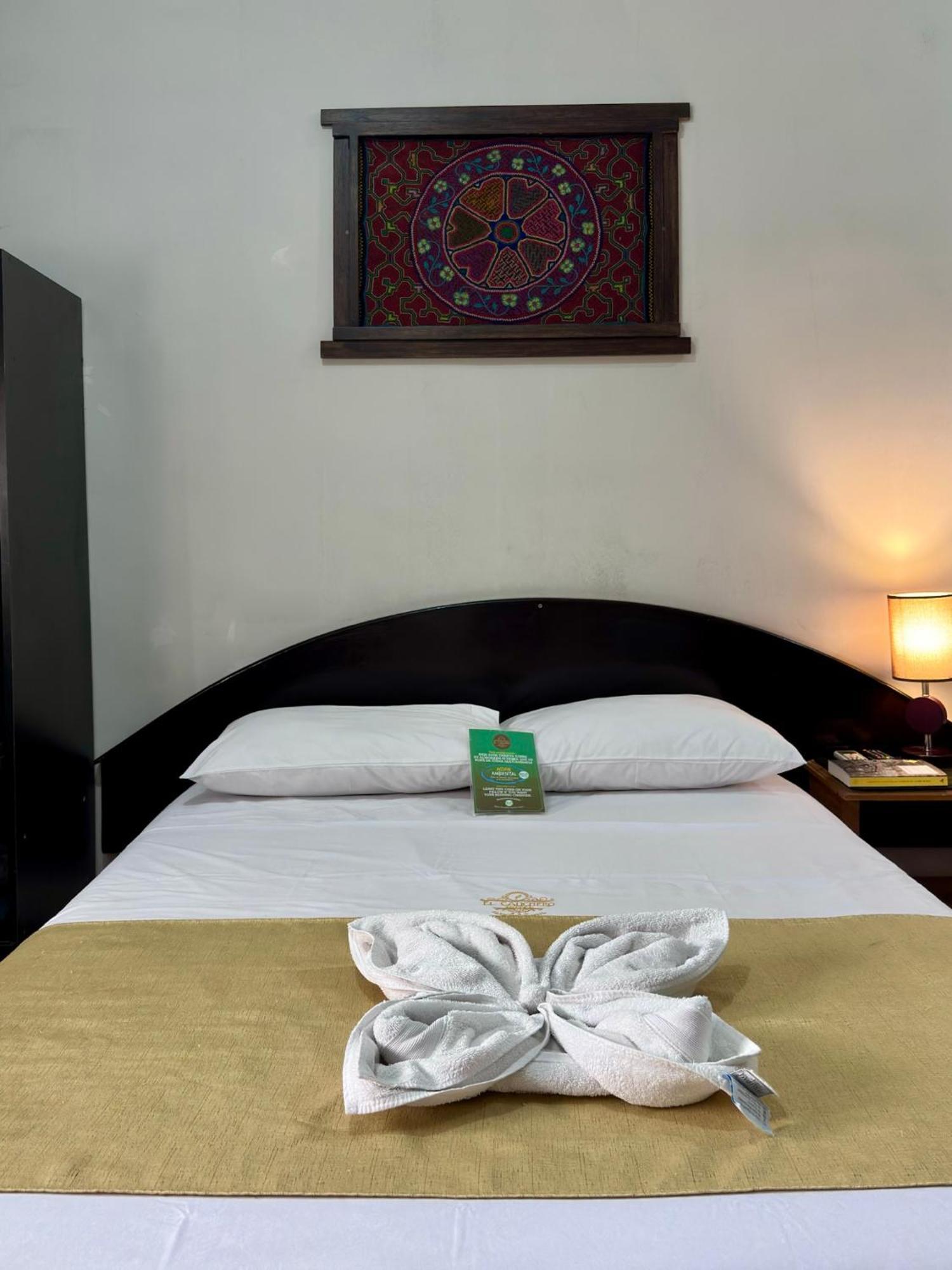 El Cauchero Hotel อีกีโตส ภายนอก รูปภาพ