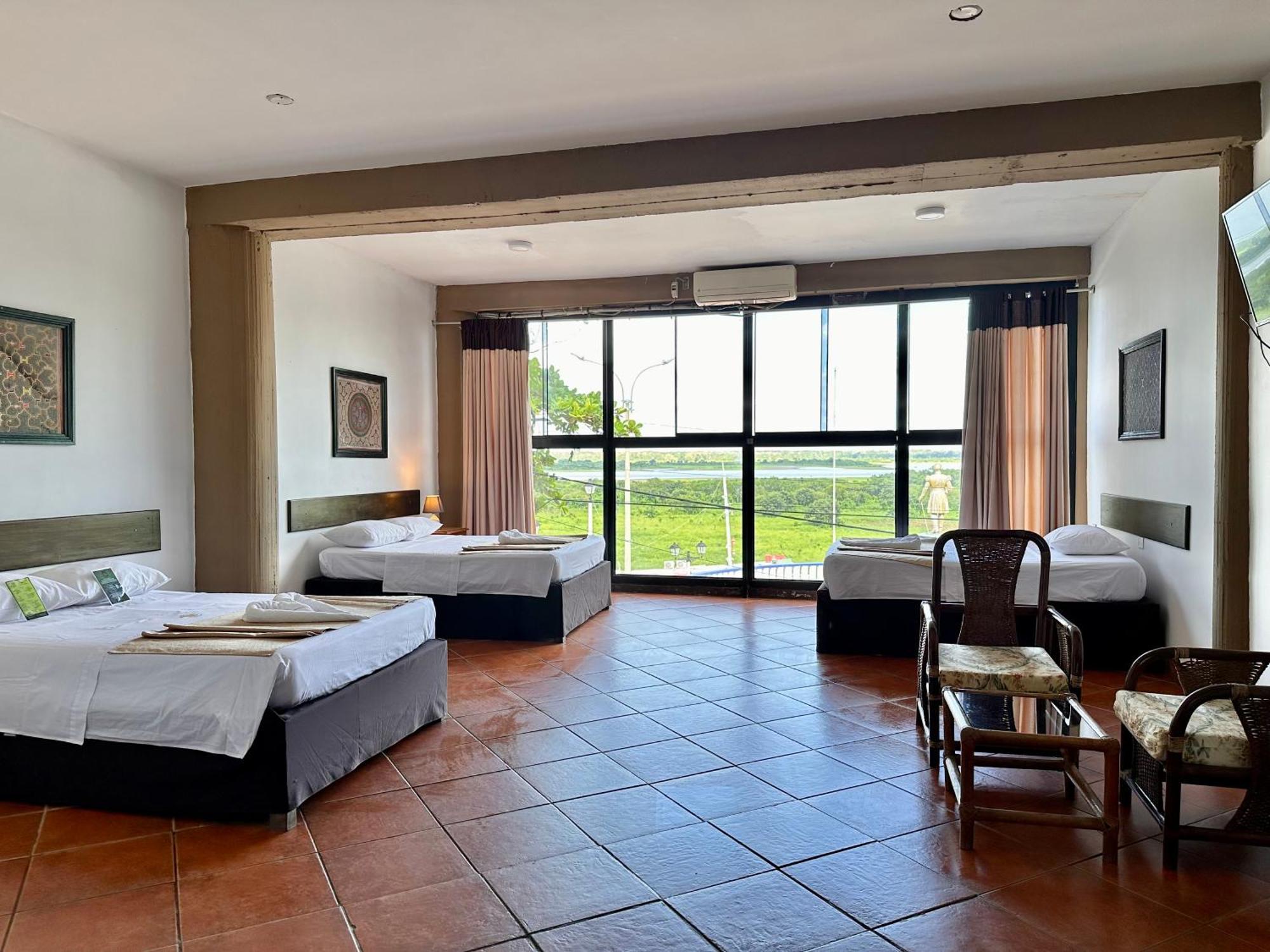 El Cauchero Hotel อีกีโตส ภายนอก รูปภาพ