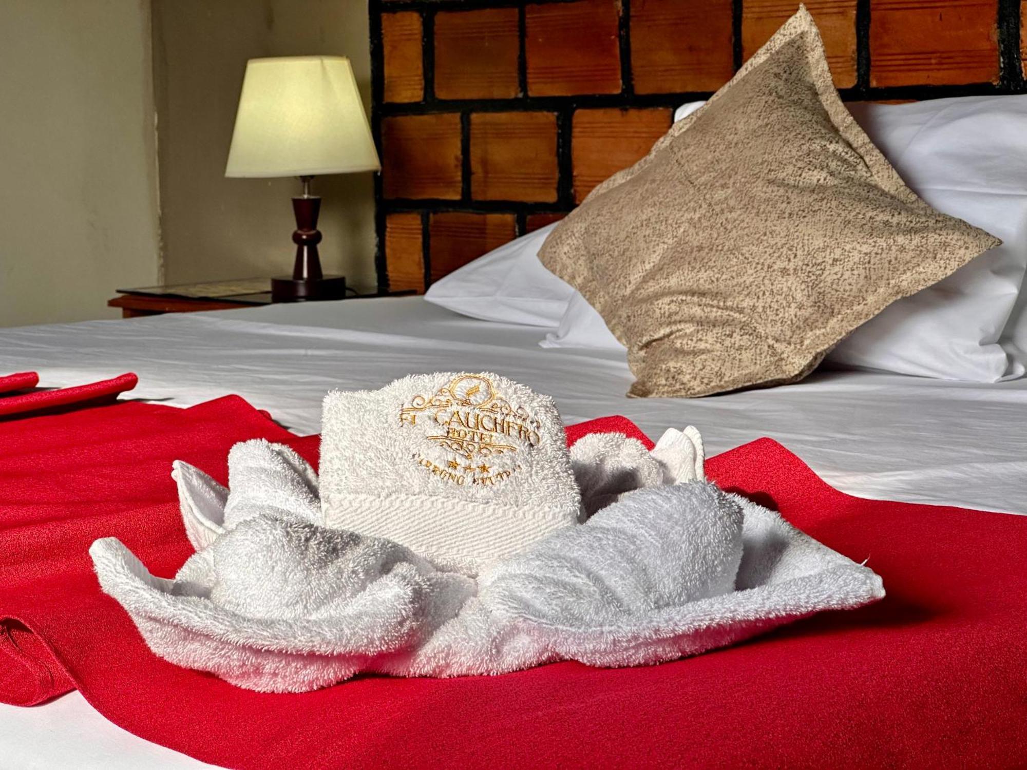 El Cauchero Hotel อีกีโตส ภายนอก รูปภาพ