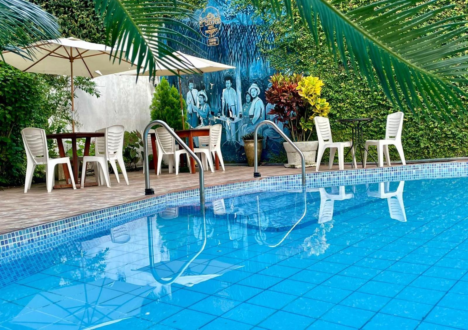 El Cauchero Hotel อีกีโตส ภายนอก รูปภาพ