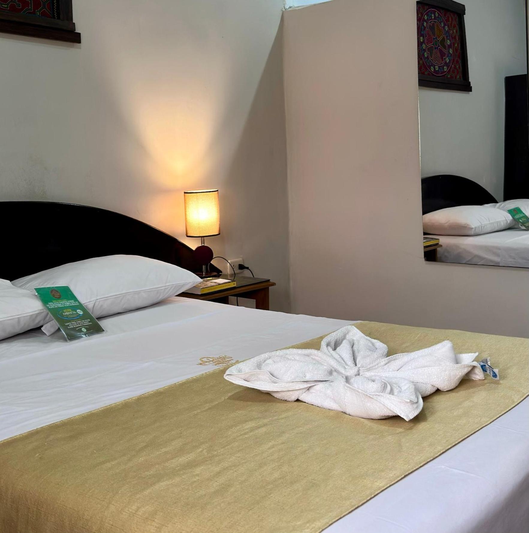 El Cauchero Hotel อีกีโตส ภายนอก รูปภาพ