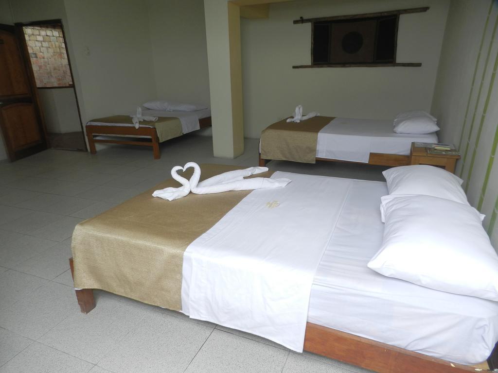 El Cauchero Hotel อีกีโตส ภายนอก รูปภาพ