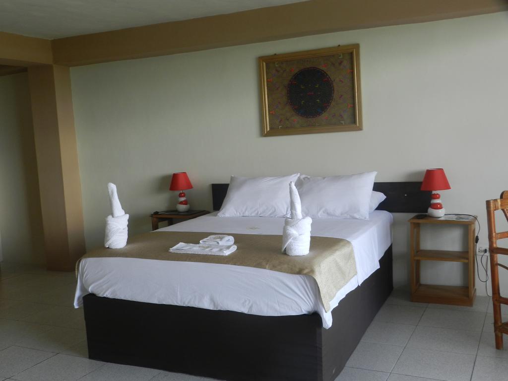 El Cauchero Hotel อีกีโตส ภายนอก รูปภาพ