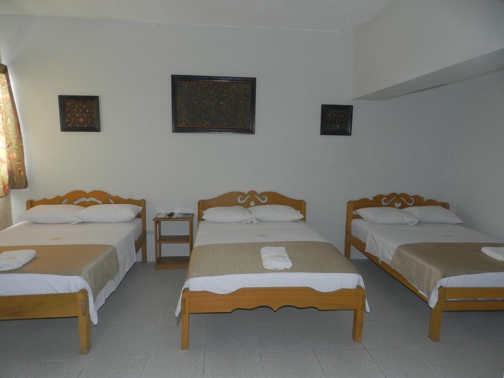 El Cauchero Hotel อีกีโตส ภายนอก รูปภาพ
