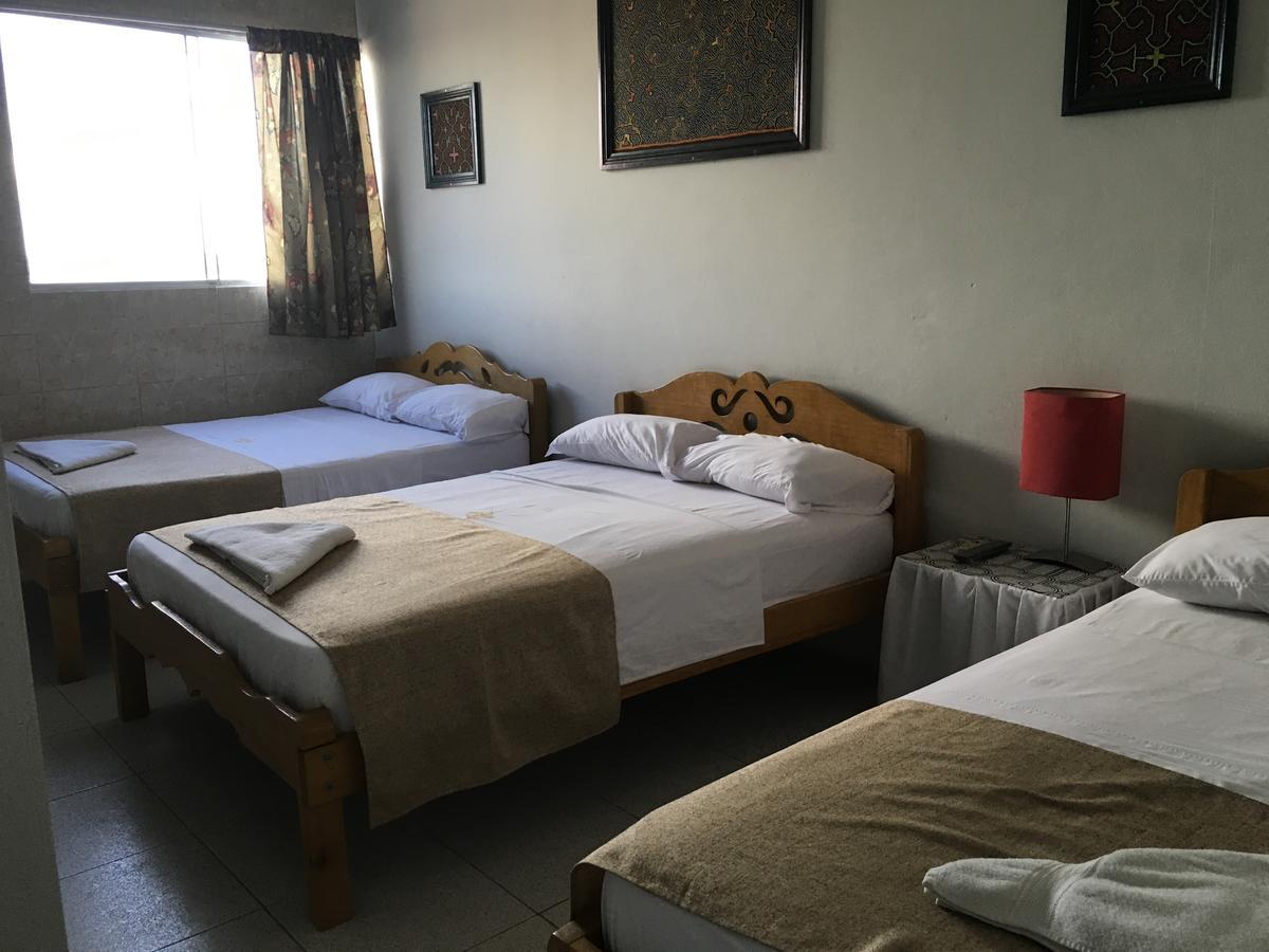 El Cauchero Hotel อีกีโตส ภายนอก รูปภาพ